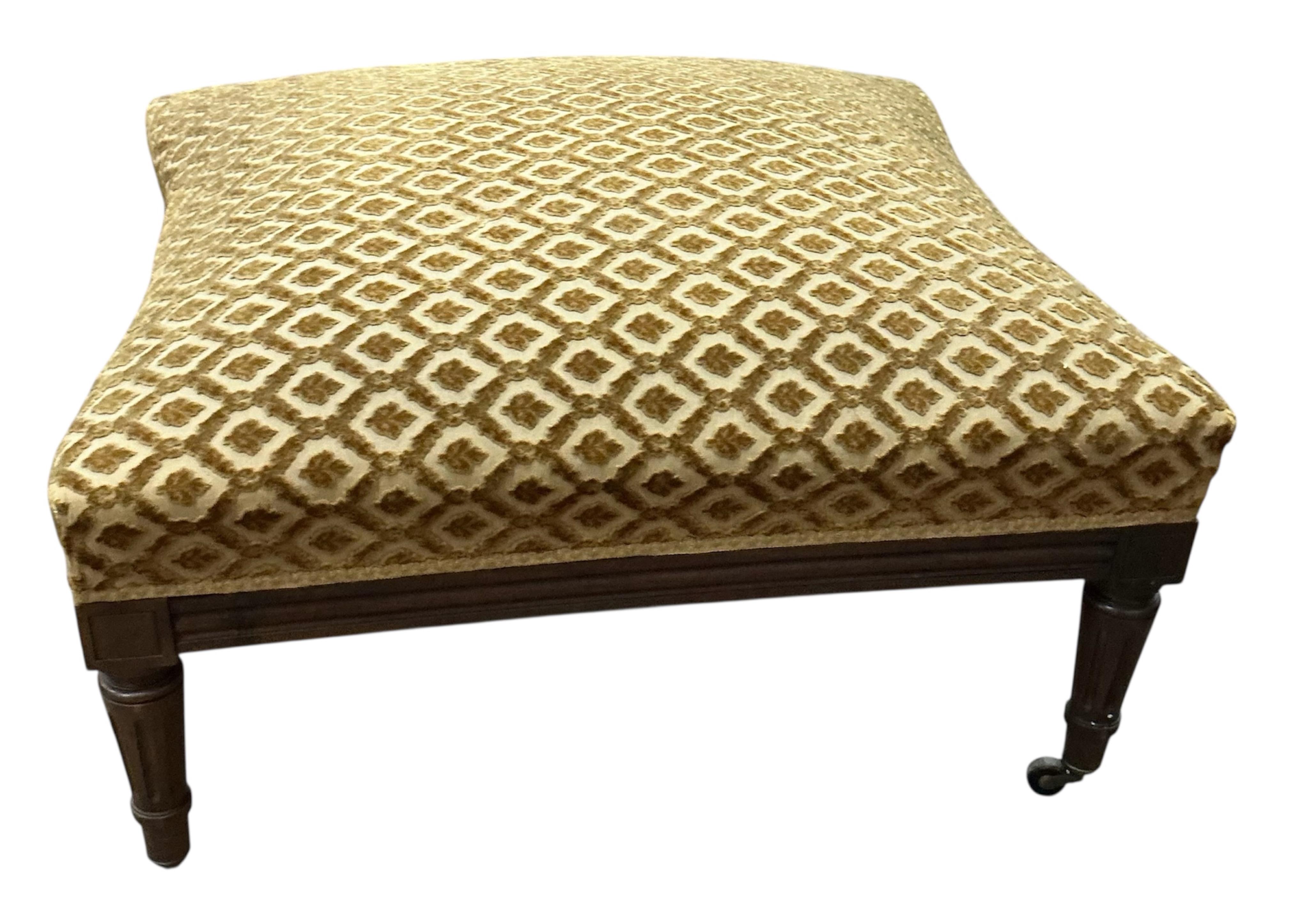 An early 20th century French walnut stool, width 68cm, height 38cm
